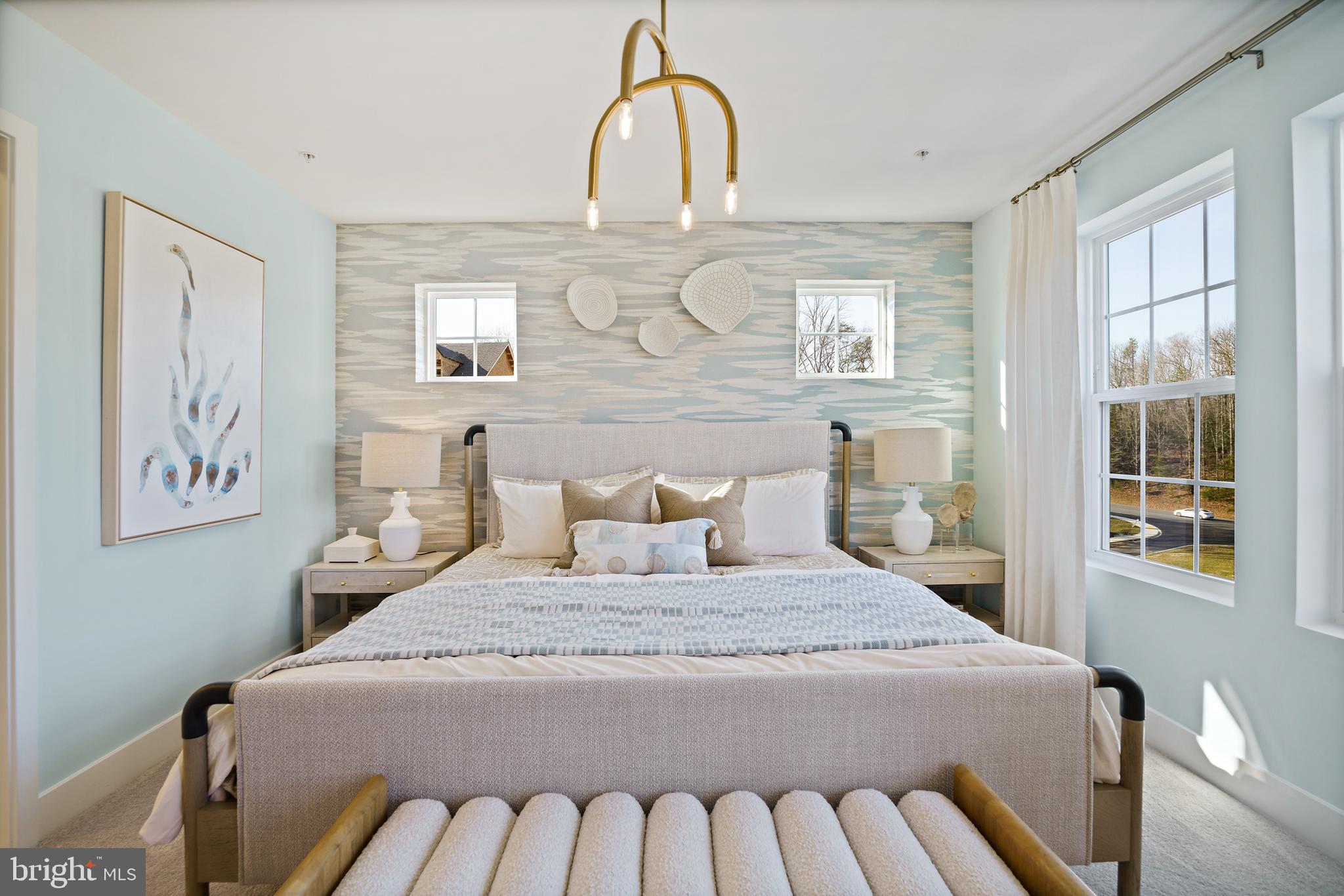 23600 Crosswinds Way California, MD 20619 - Photo 35 of 55 a bedroom with a bed and glass windows