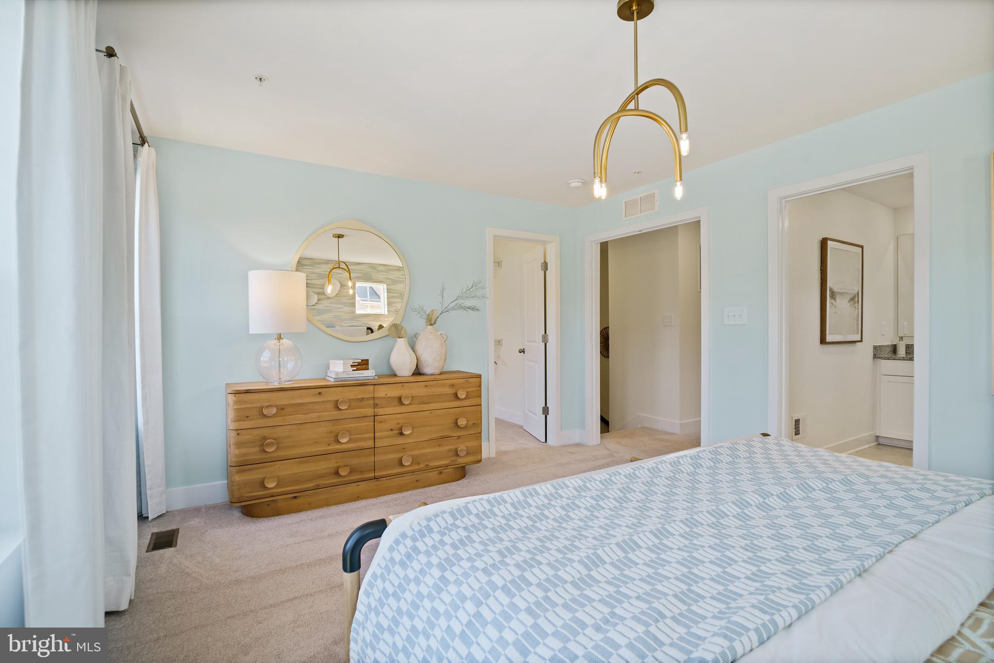 23600 Crosswinds Way California, MD 20619 - Photo 36 of 55 a bedroom with a bed and a dresser