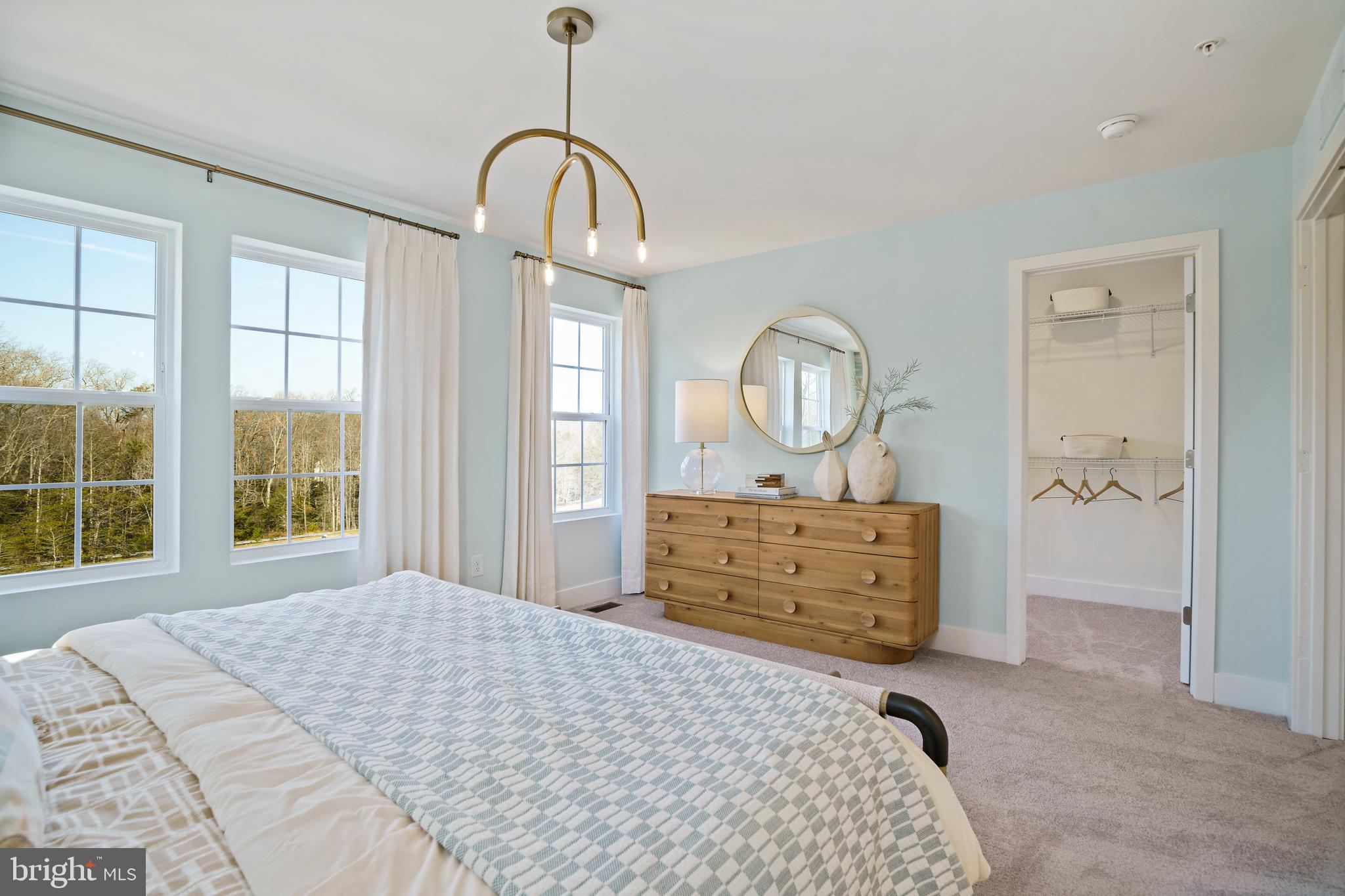 23600 Crosswinds Way California, MD 20619 - Photo 37 of 55 a bedroom with a bed and a dresser