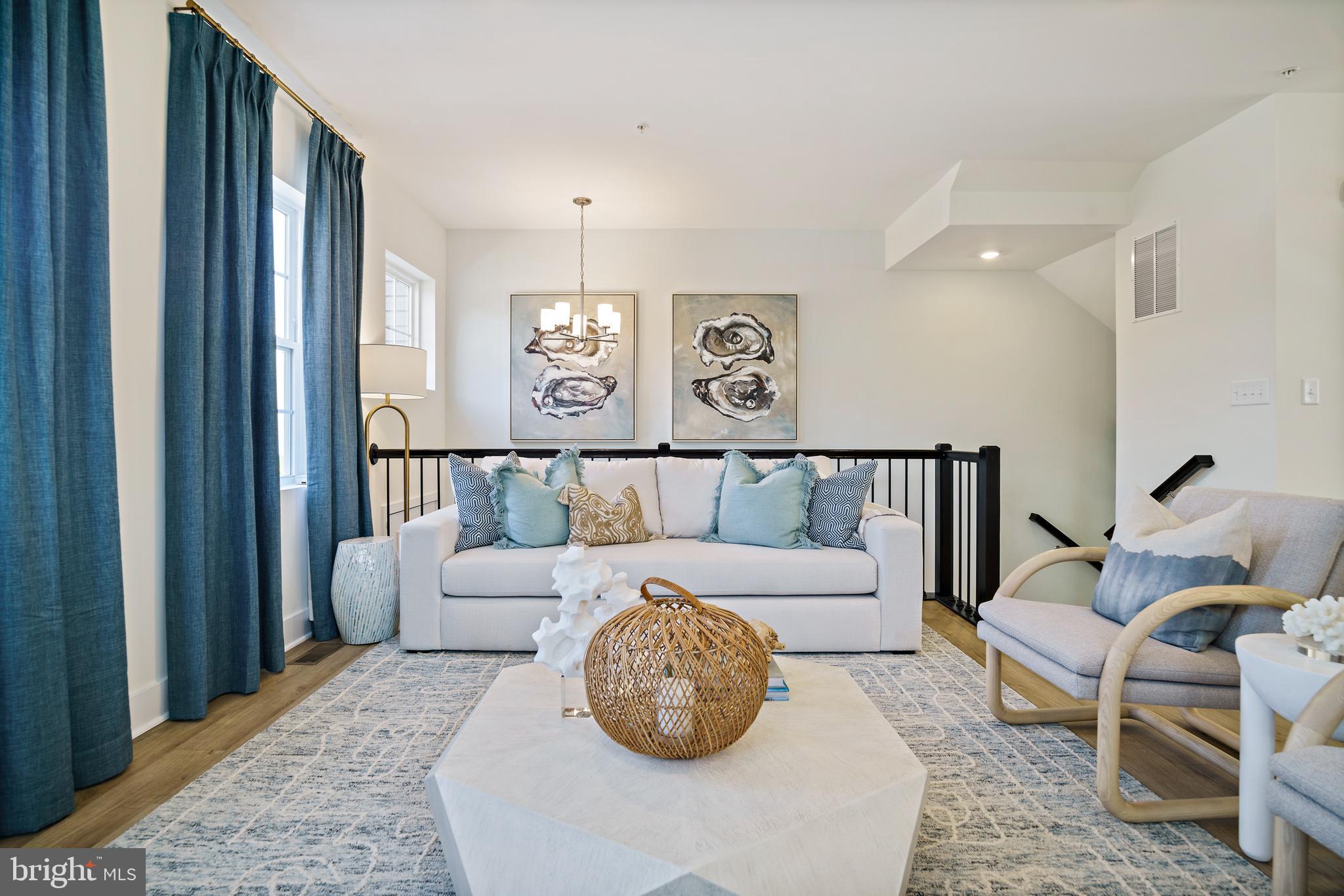 23600 Crosswinds Way California, MD 20619 - Photo 4 of 55 a bedroom with a large bed and a couch