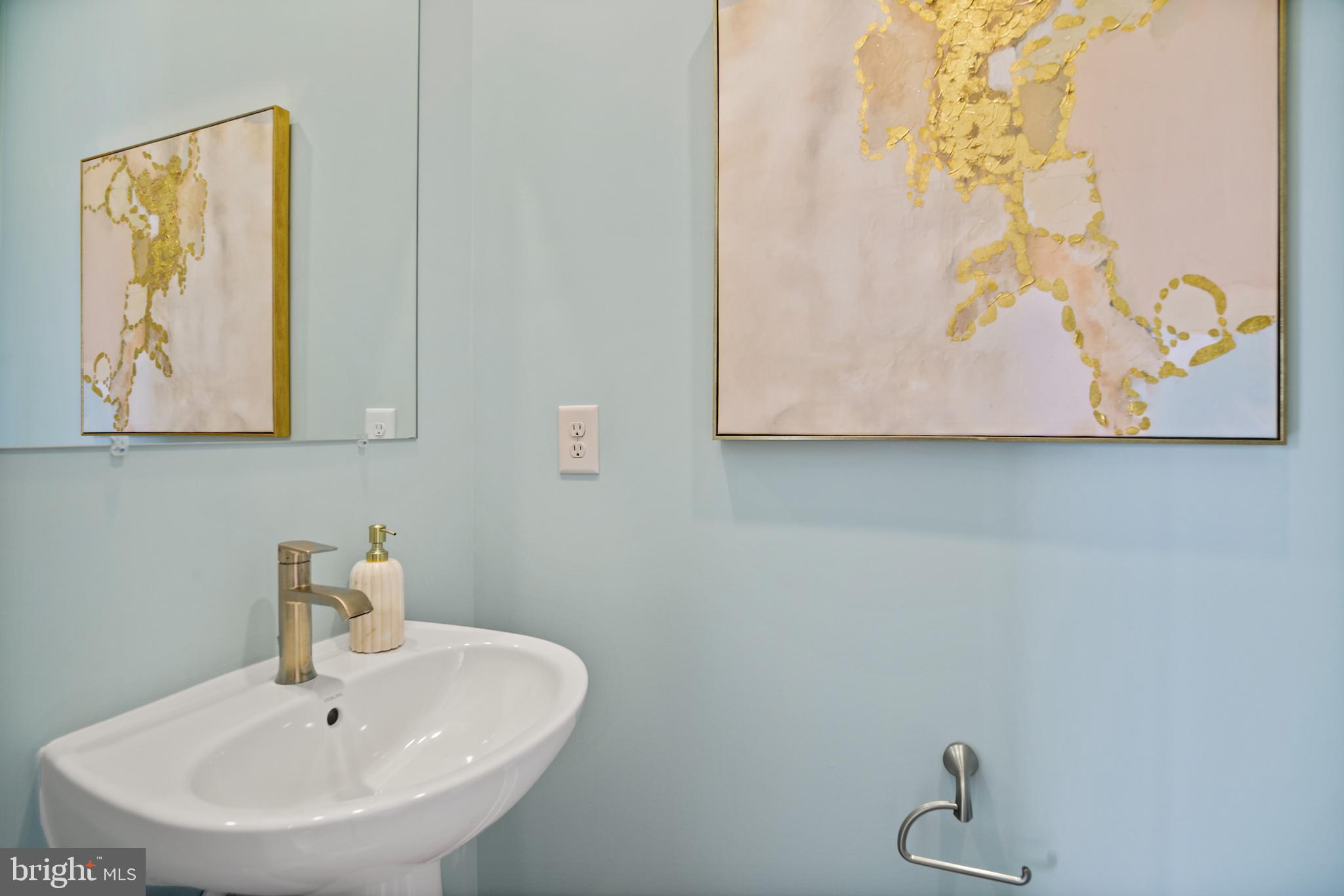 23600 Crosswinds Way California, MD 20619 - Photo 43 of 55 a bathroom with a sink and mirror