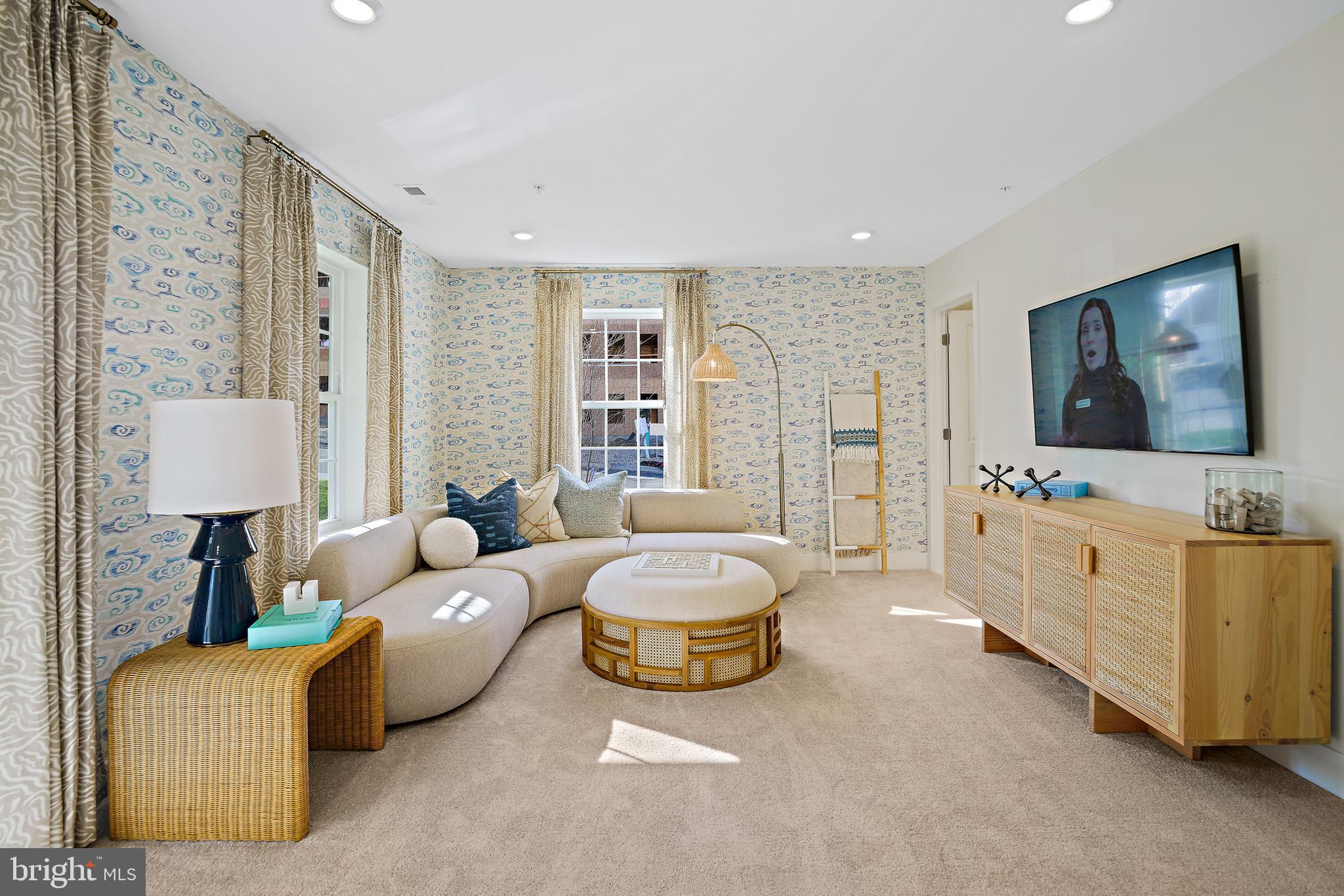 23600 Crosswinds Way California, MD 20619 - Photo 47 of 55 a living room with furniture and a flat screen tv