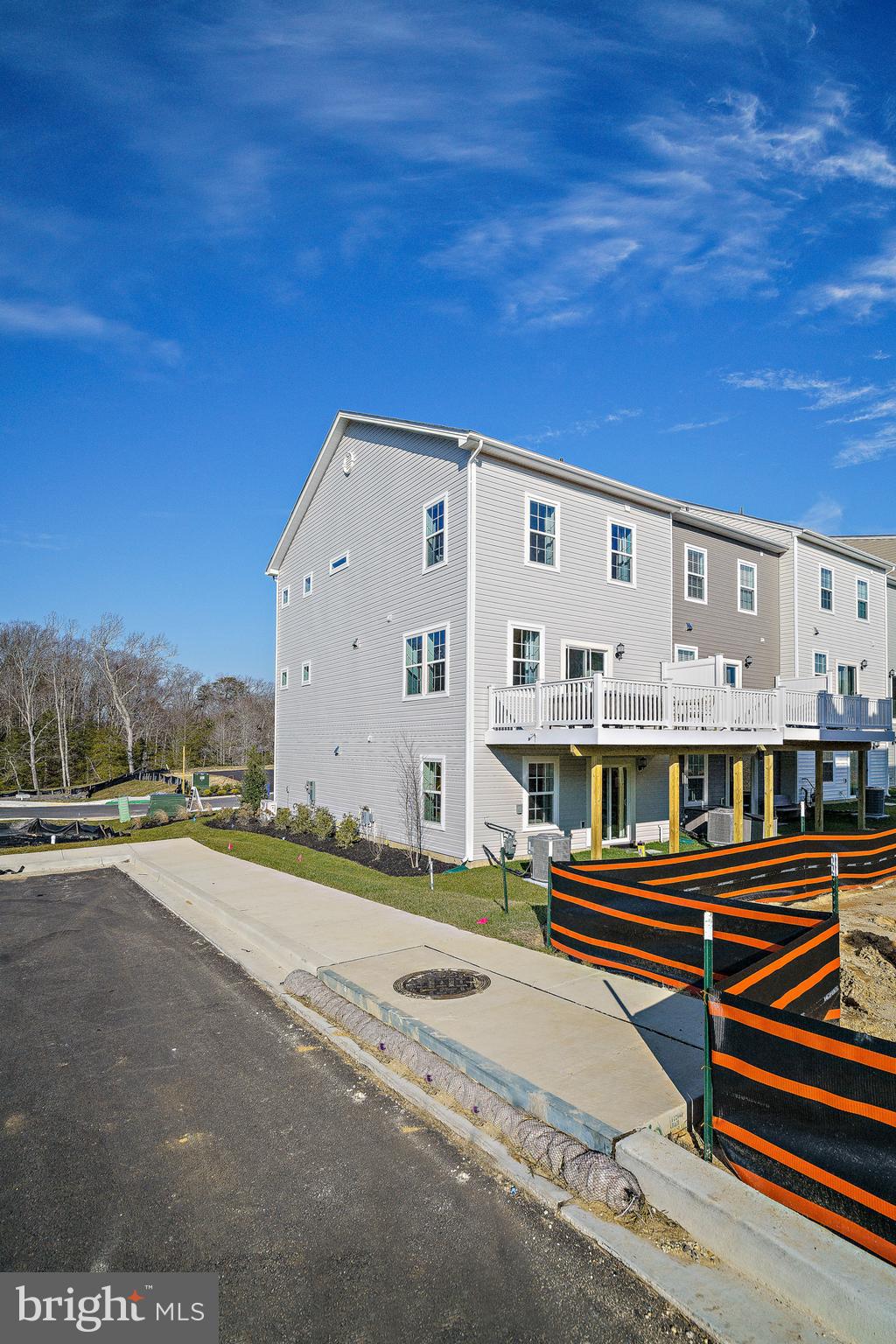 23600 Crosswinds Way California, MD 20619 - Photo 52 of 55 a front view of a building with streets and trees