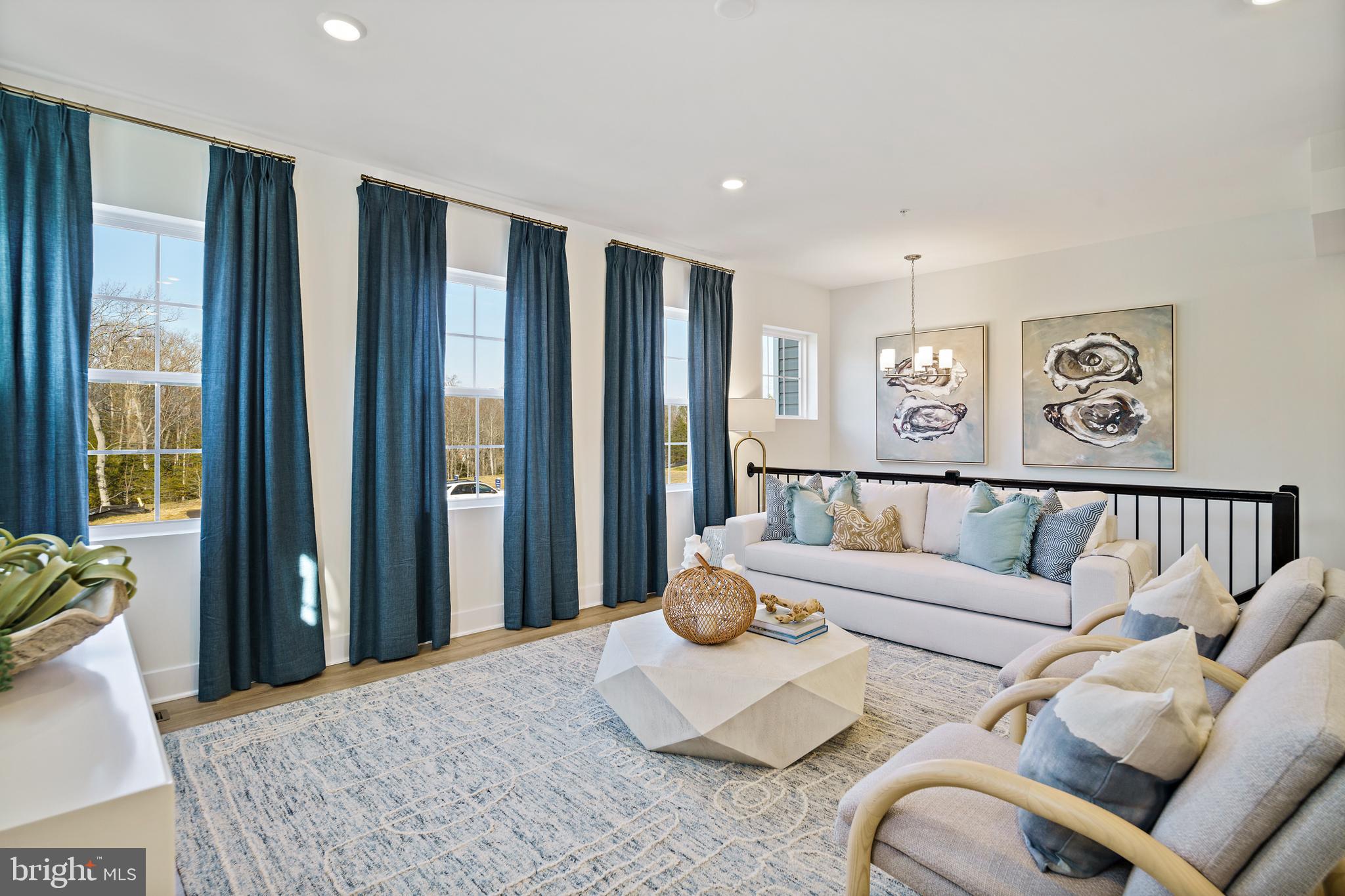 23600 Crosswinds Way California, MD 20619 - Photo 6 of 55 a living room with furniture and large window