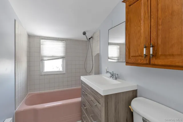 a bathroom with a sink and a bathtub