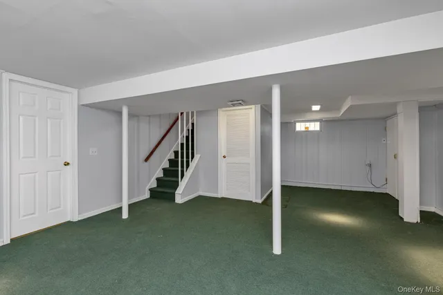 a view of entryway with stairs