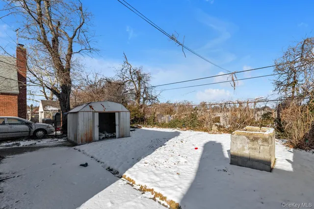 a view of a city street with a car park side of the road