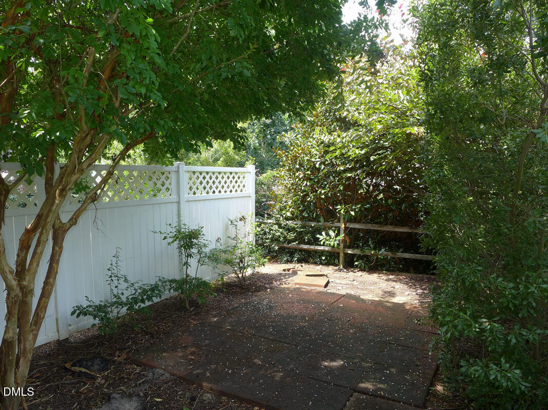 314 Davie Road, Unit B Carrboro, NC 27510 - Photo 11 of 15 a sign that is sitting in the middle of a forest