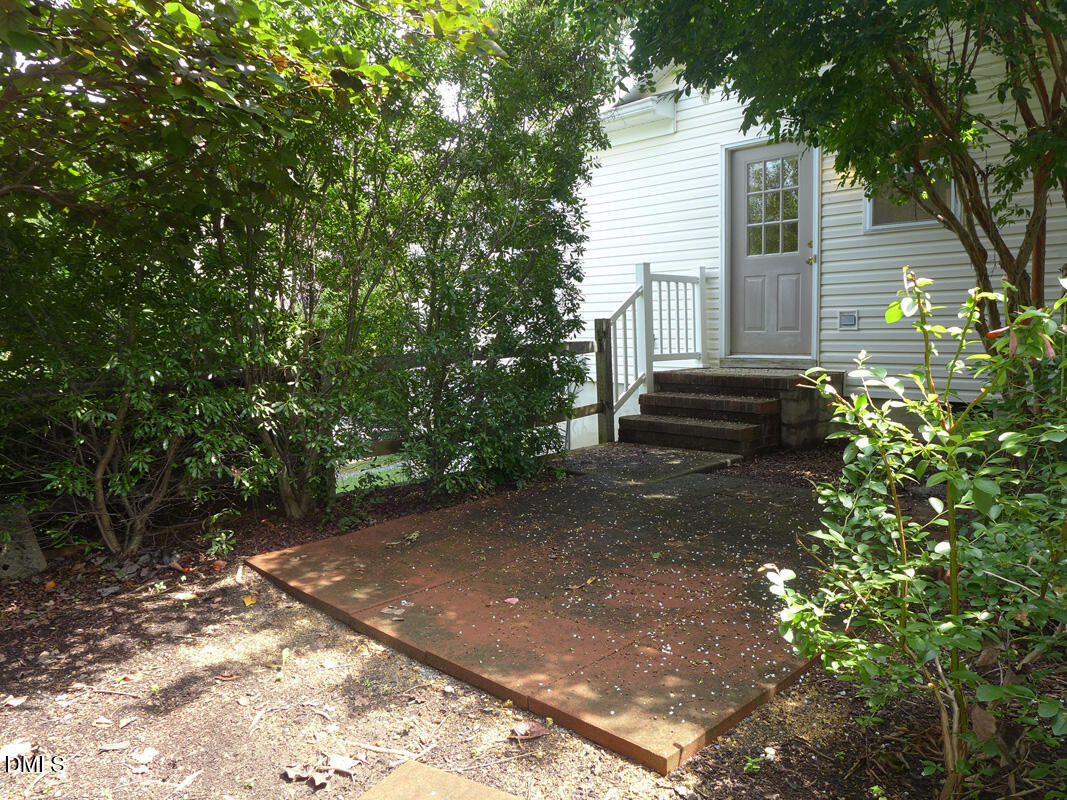 314 Davie Road, Unit B Carrboro, NC 27510 - Photo 12 of 15 a view of a house with a yard