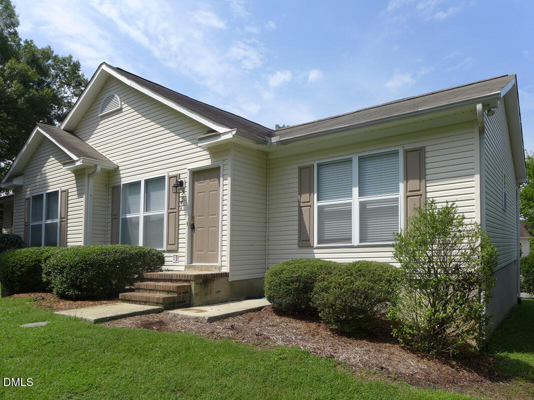 314 Davie Road, Unit B Carrboro, NC 27510 - Photo 14 of 15 a view of a house with a yard and plants
