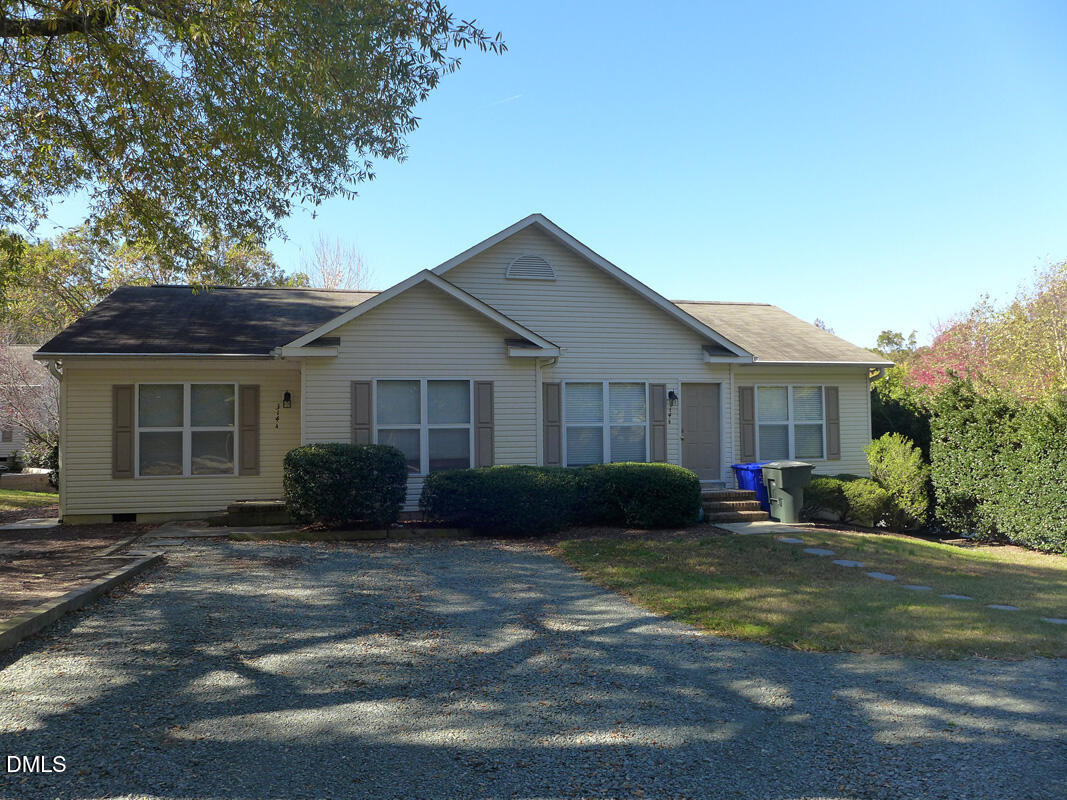 314 Davie Road, Unit B Carrboro, NC 27510 - Photo 15 of 15 a front view of a house with a garden