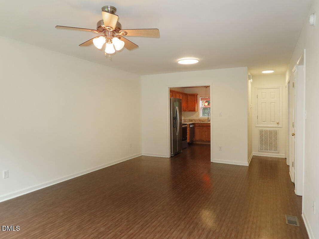 314 Davie Road, Unit B Carrboro, NC 27510 - Photo 2 of 15 a view of an empty room with wooden floor