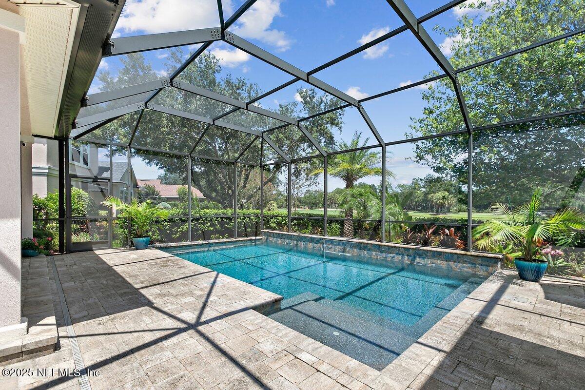 417 Blagdon Court Jacksonville, FL 32225 - Photo 18 of 43 a view of backyard with a patio and plants