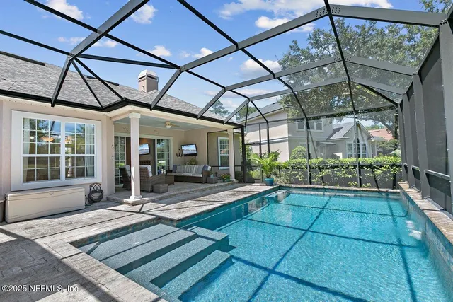 a view of a house with sitting area and windows