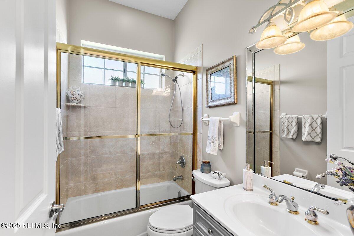 417 Blagdon Court Jacksonville, FL 32225 - Photo 25 of 43 a bathroom with a sink toilet and shower