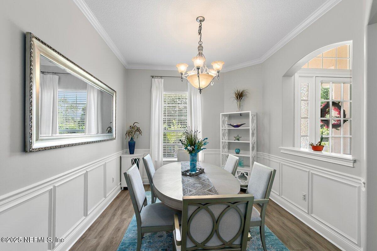 417 Blagdon Court Jacksonville, FL 32225 - Photo 4 of 43 a view of a dining room with furniture window and wooden floor