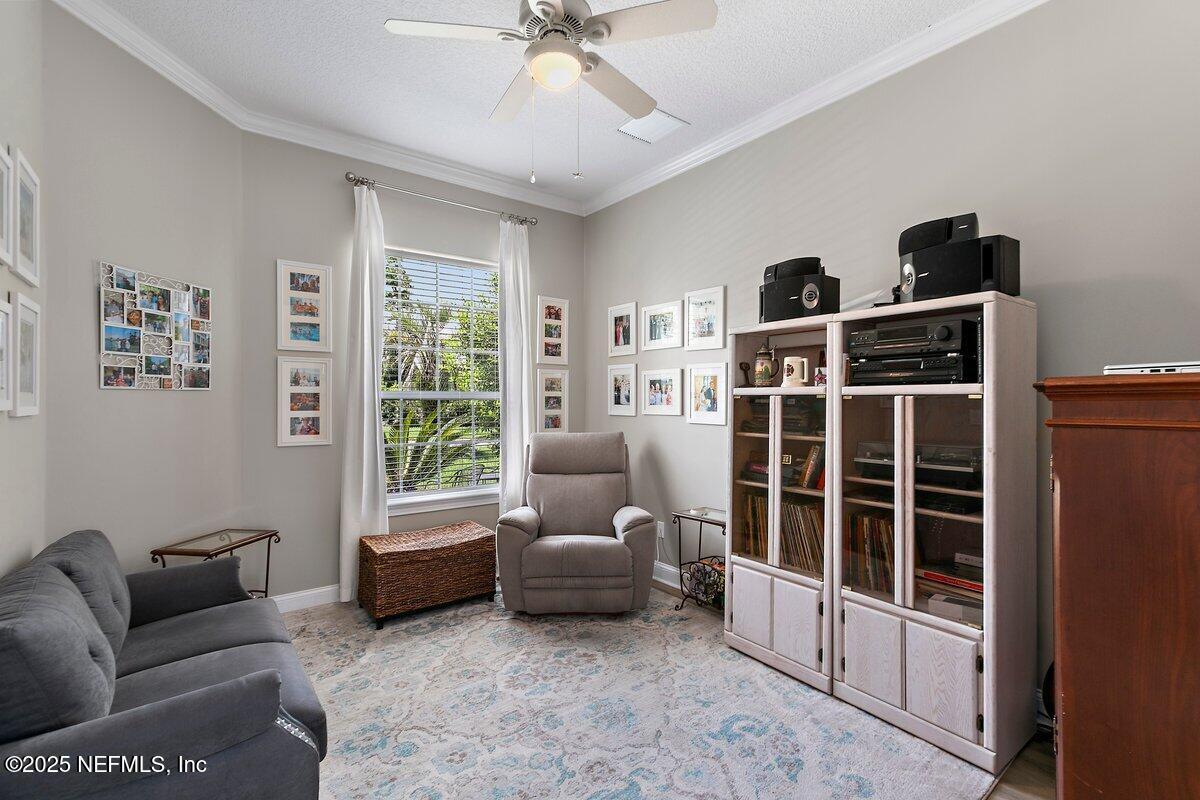 417 Blagdon Court Jacksonville, FL 32225 - Photo 5 of 43 a living room with furniture and a large window
