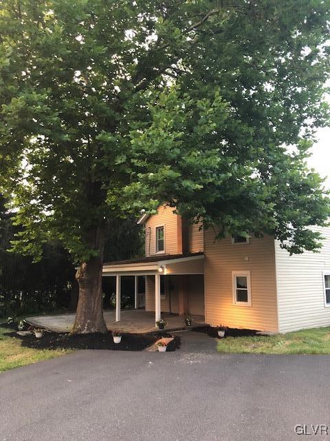 4447 Shankweiler Road Orefield, PA 18069 - Photo 2 of 11 a front view of a house with a yard