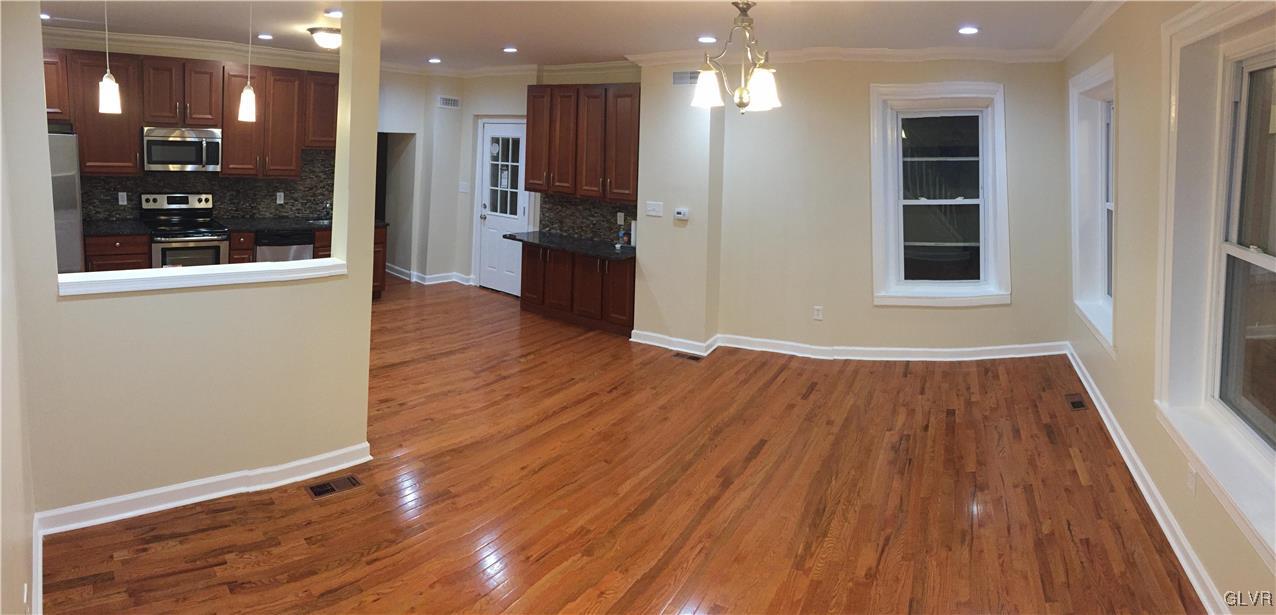 4447 Shankweiler Road Orefield, PA 18069 - Photo 7 of 11 an empty room with wooden floor and windows
