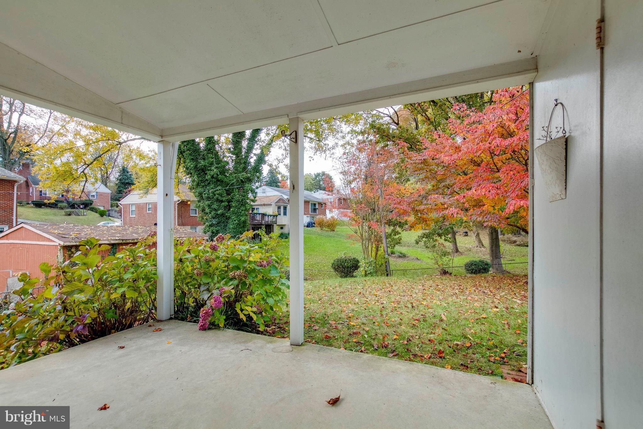 6804 Queens Ferry Road Baltimore, MD 21239 - Photo 27 of 30 View of yard from covered patio