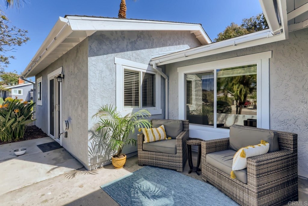2015 Shadow Grove Way Encinitas, CA 92024 - Photo 24 of 28 a outdoor living space with furniture and a potted plant