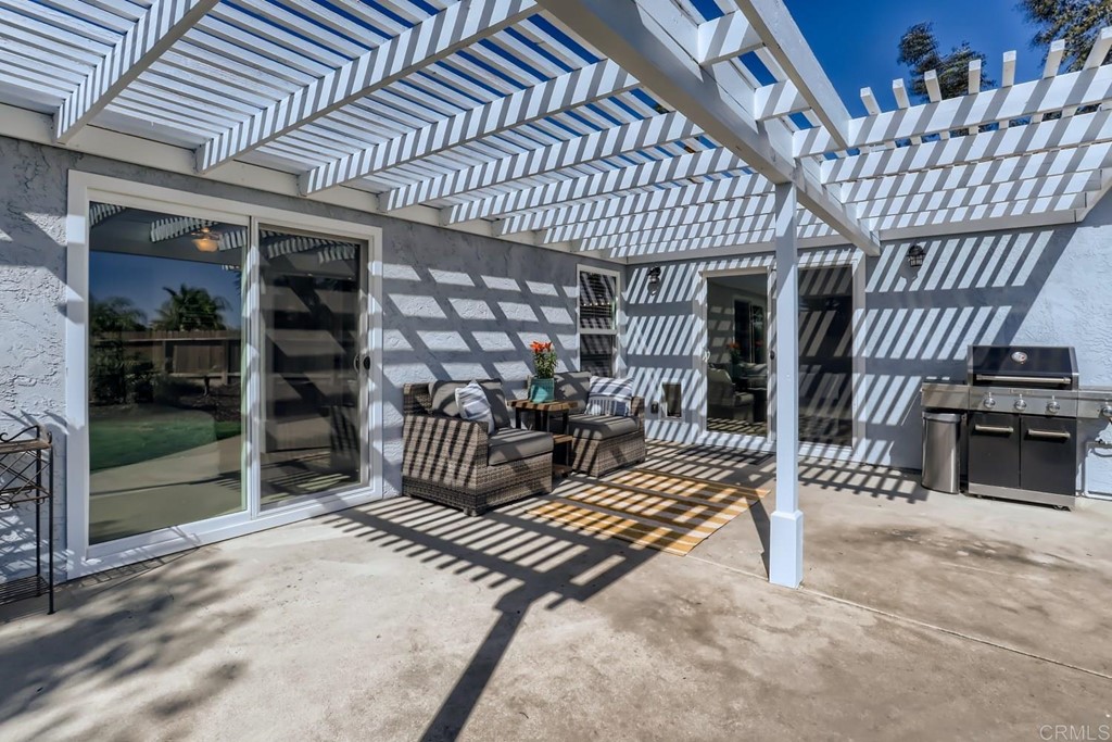 2015 Shadow Grove Way Encinitas, CA 92024 - Photo 25 of 28 a view of a porch with a bench