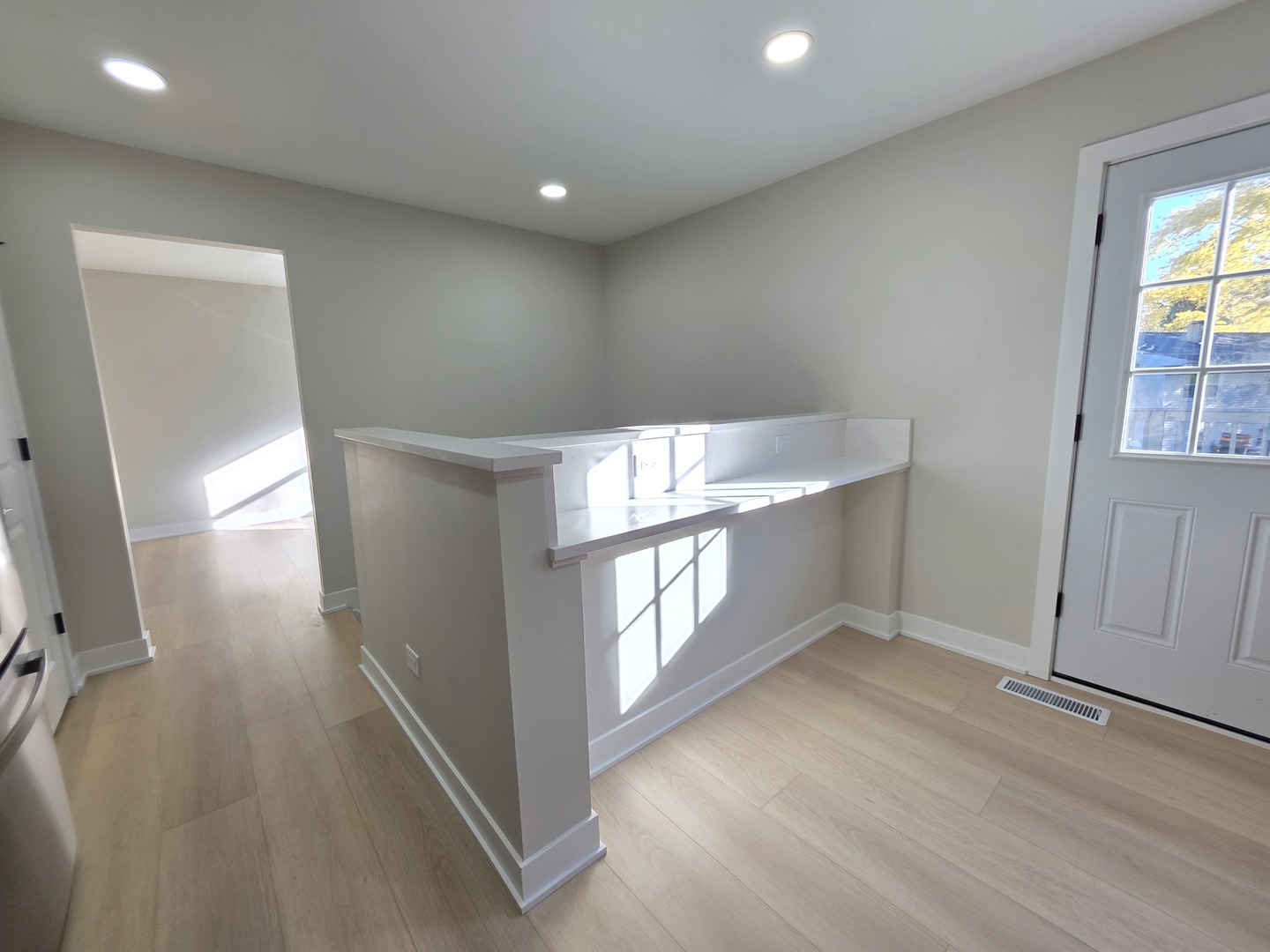 2187 Walnut Avenue Hanover Park, IL 60133 - Photo 14 of 38 wooden floor in an empty room with a window