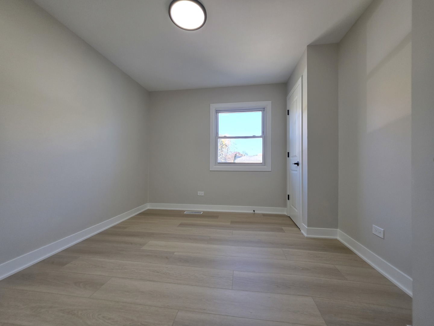 2187 Walnut Avenue Hanover Park, IL 60133 - Photo 17 of 38 a view of empty room with window