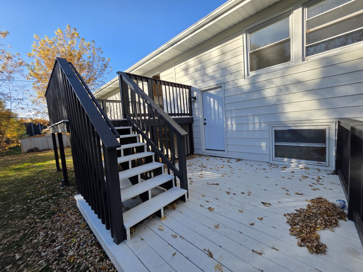 2187 Walnut Avenue Hanover Park, IL 60133 - Photo 36 of 38 a view of a backyard with a deck