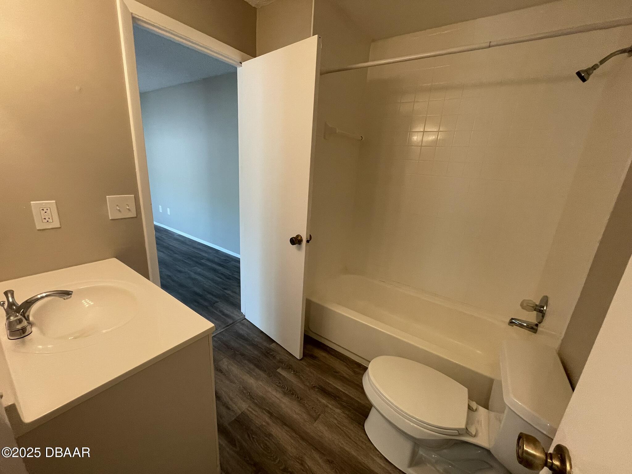 97 Springwood Square Port Orange, FL 32129 - Photo 21 of 23 a bathroom with a sink toilet and shower