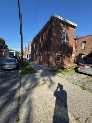 a view of a street with cars