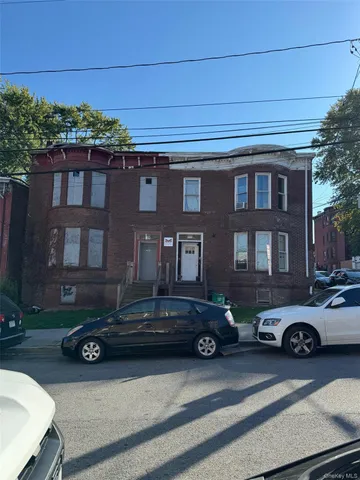 a car parked in front of a building
