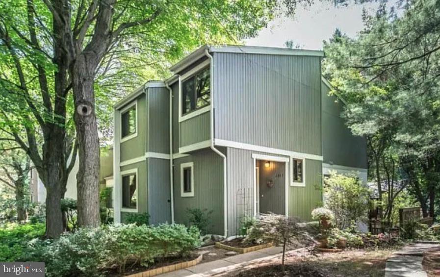 2347 Millennium Lane Reston, VA 20191 - Photo 1 of 1 Charming modern home in lush greenery.