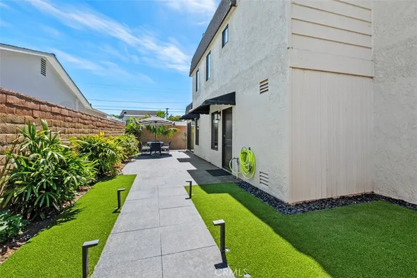 a view of a back yard of the house