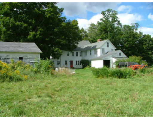 15 S Road Heath, MA 01346 - Photo 4 of 17 a front view of a house with garden