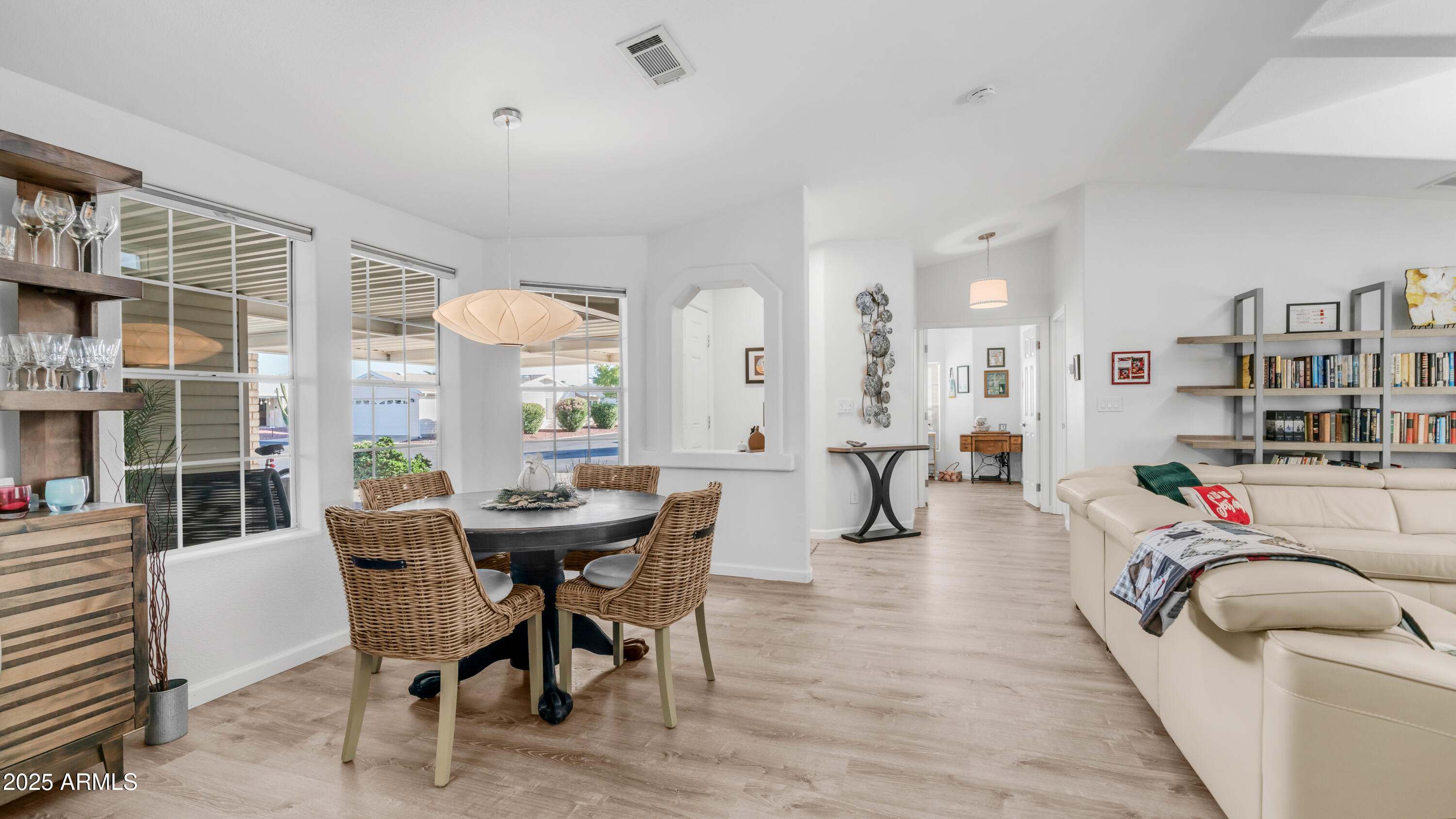2550 South Ellsworth Road, Unit 751 Mesa, AZ 85209 - Photo 5 of 27 a view of a dining room with furniture and window