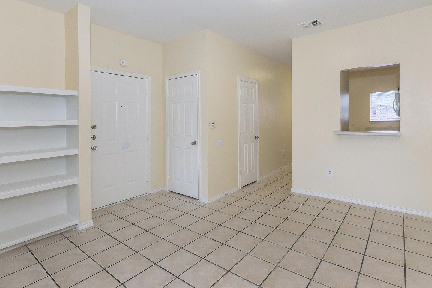 9257 Somerset Road San Antonio, TX 78211 - Photo 13 of 18 a view of an empty room and window