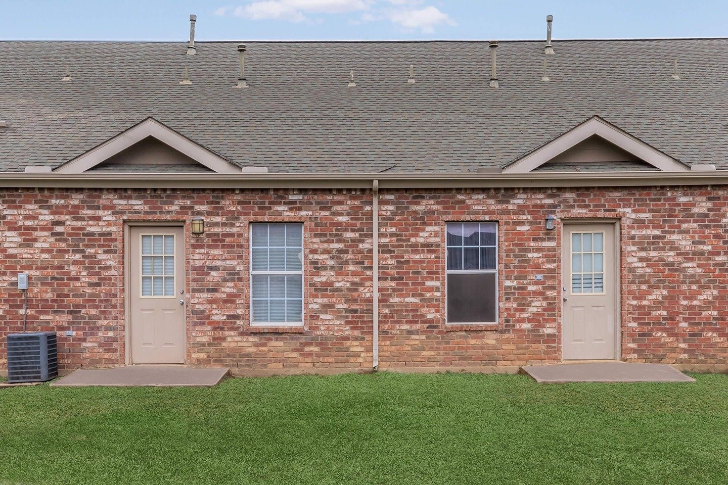 9257 Somerset Road San Antonio, TX 78211 - Photo 2 of 18 front view of a house with a yard
