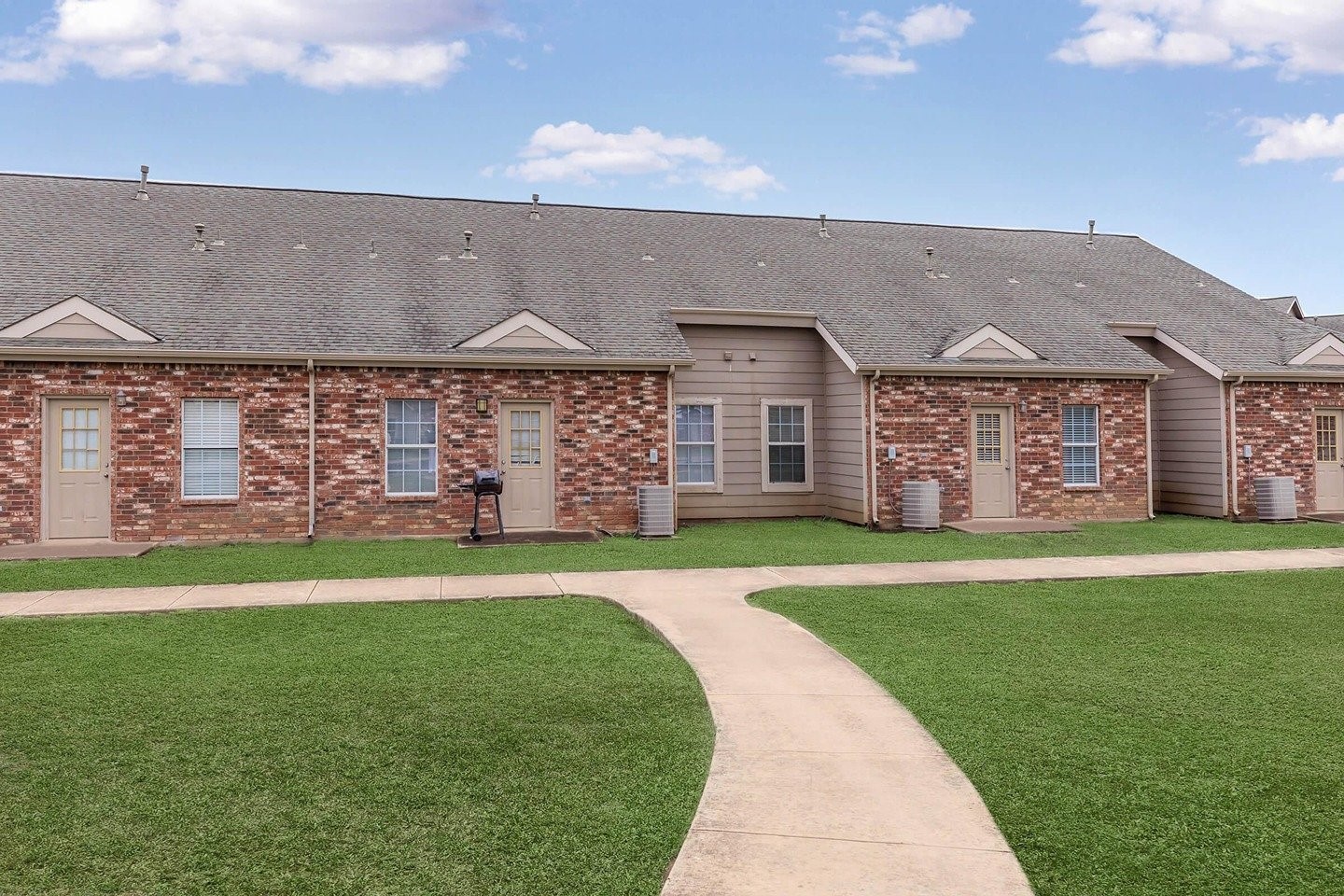 9257 Somerset Road San Antonio, TX 78211 - Photo 3 of 18 a front view of a house with a garden