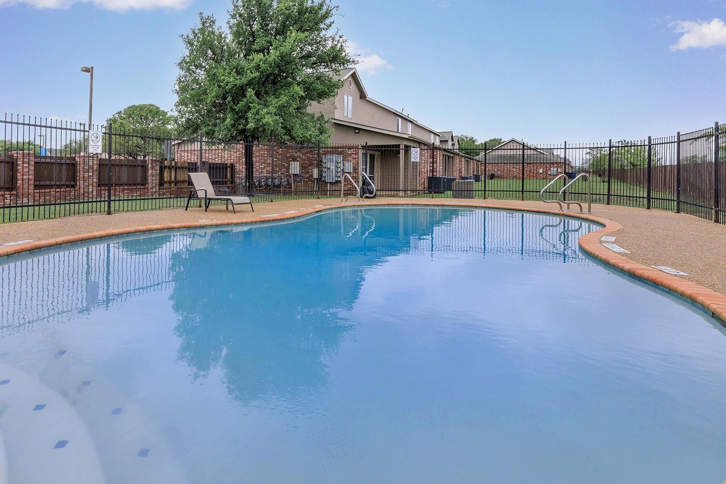 9257 Somerset Road San Antonio, TX 78211 - Photo 7 of 18 a view of a house with a swimming pool