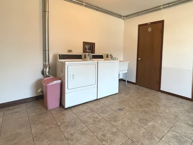 a view of kitchen and utility room