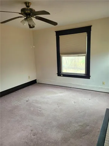 a view of a room with a window