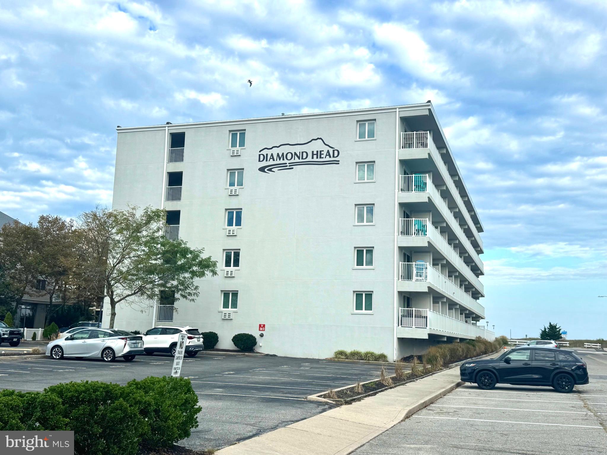 2 80th Street, Unit 212 Ocean City, MD 21842 - Photo 2 of 27 a front view of a building with street