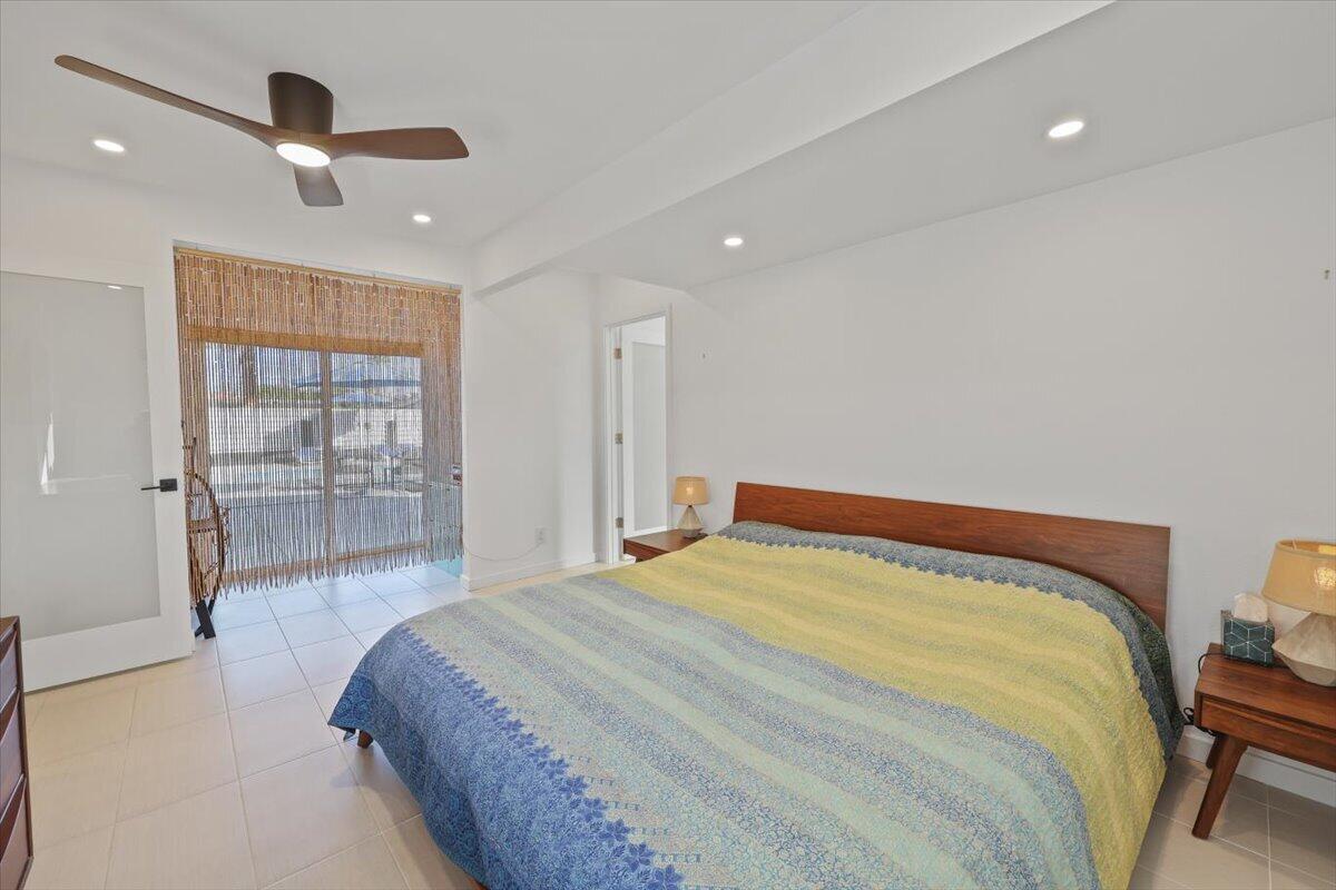 3991 Calle San Raphael Palm Springs, CA 92264 - Photo 23 of 45 a bedroom with a bed and a large window