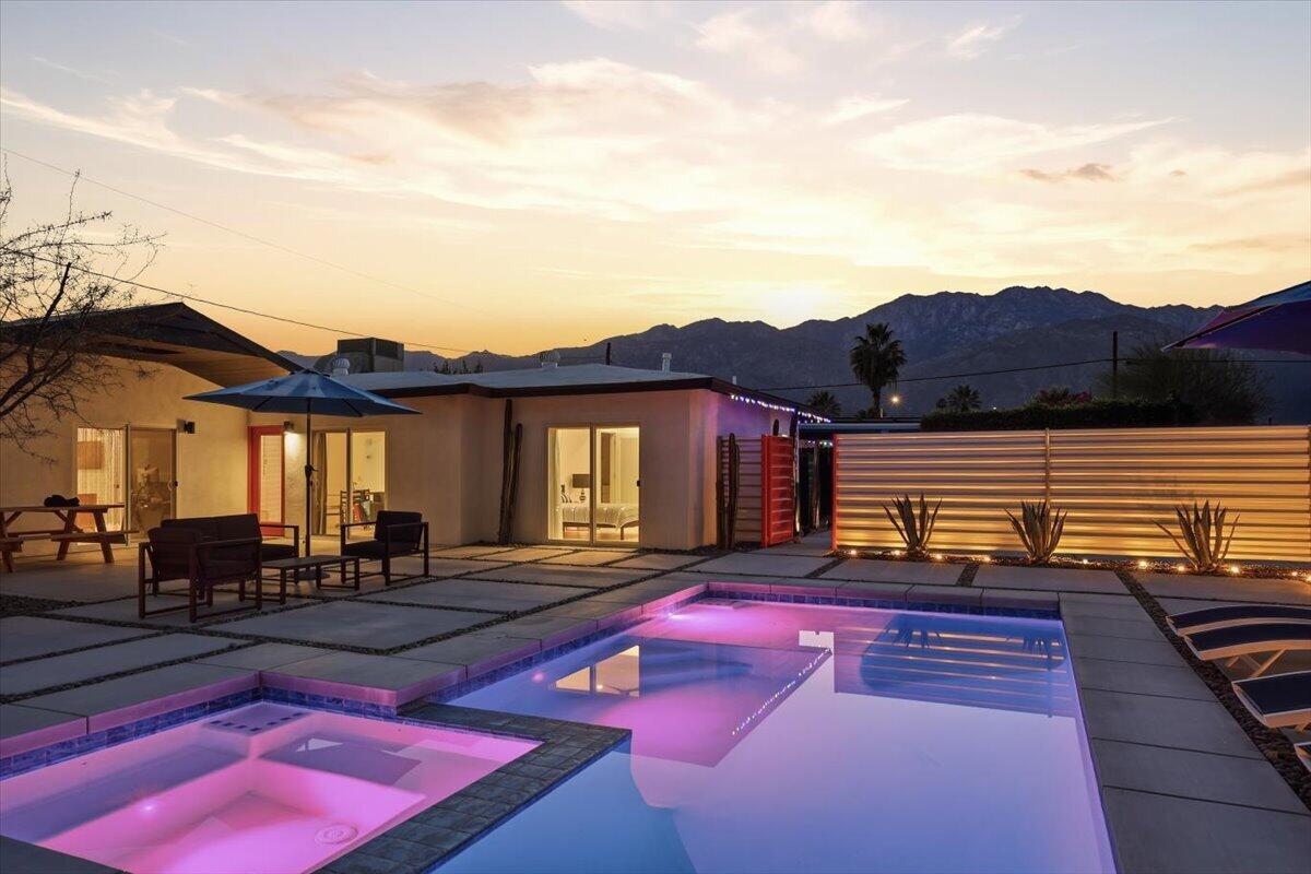 3991 Calle San Raphael Palm Springs, CA 92264 - Photo 30 of 45 a view of a swimming pool with lounge chairs
