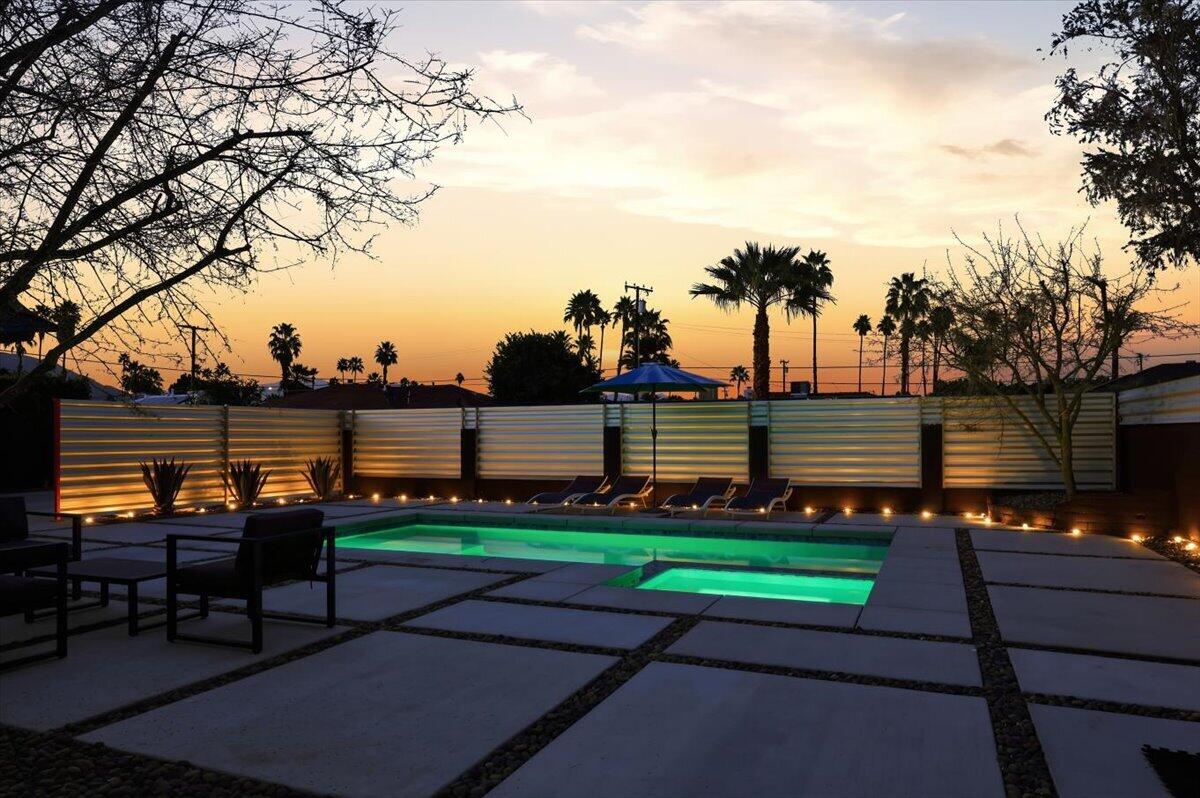 3991 Calle San Raphael Palm Springs, CA 92264 - Photo 32 of 45 a backyard of a house with table and chairs