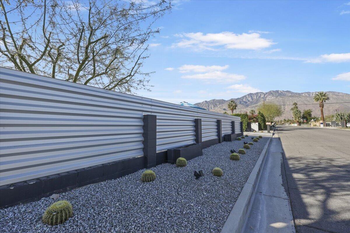 3991 Calle San Raphael Palm Springs, CA 92264 - Photo 35 of 45 a view of a terrace with a yard