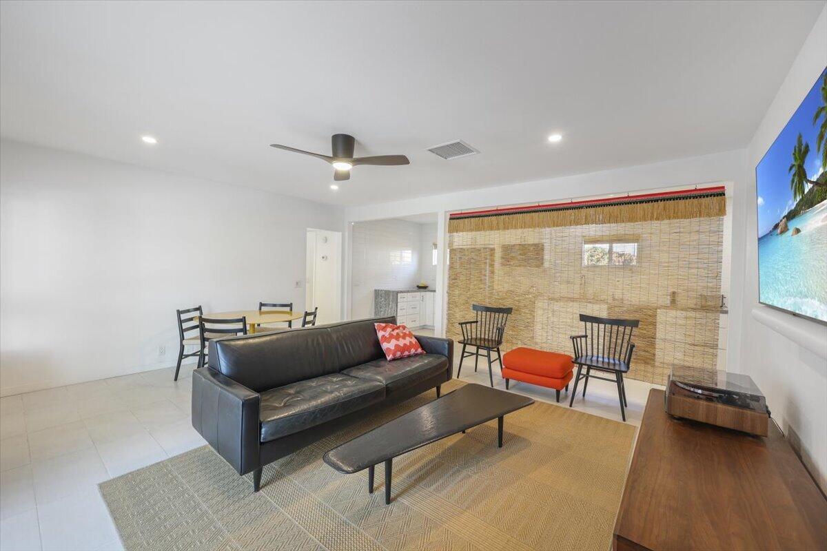 3991 Calle San Raphael Palm Springs, CA 92264 - Photo 9 of 45 a living room with furniture and a large window