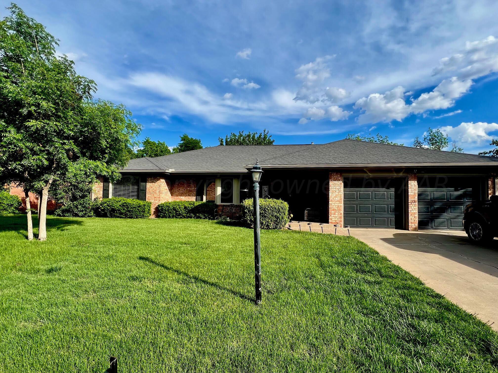 6213 Dreyfuss Road Amarillo, TX 79106 - Photo 1 of 27 a view of a house with a yard and tree s