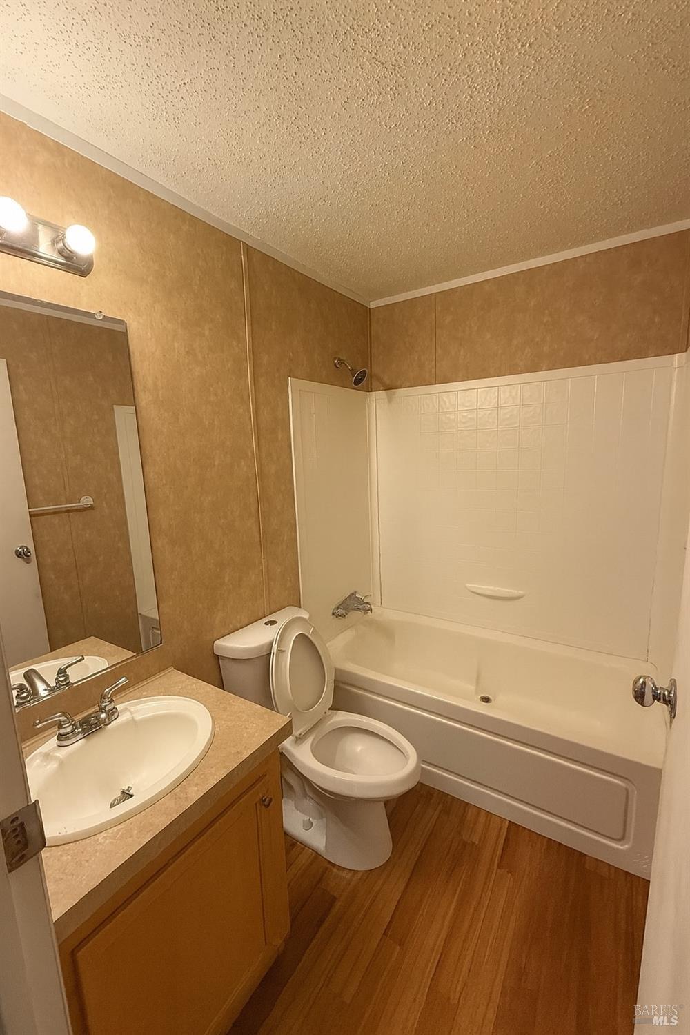 19925 South Main Street, Unit 18 Willits, CA 95490 - Photo 13 of 14 a bathroom with a sink a toilet and shower